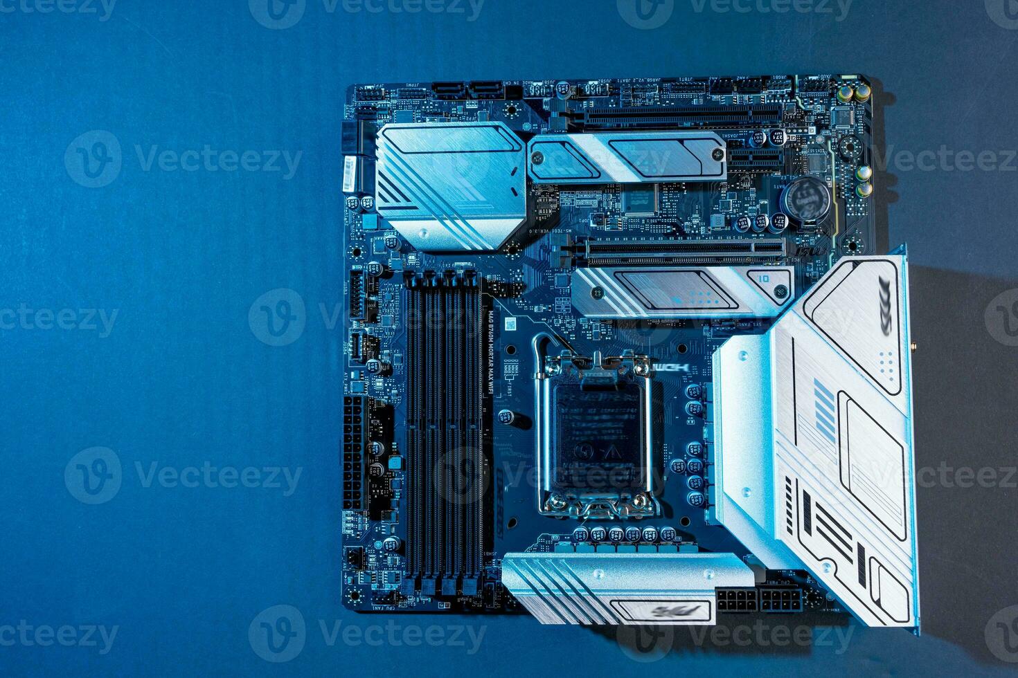modern powerful and fast motherboard with slots for memory and CPU photo