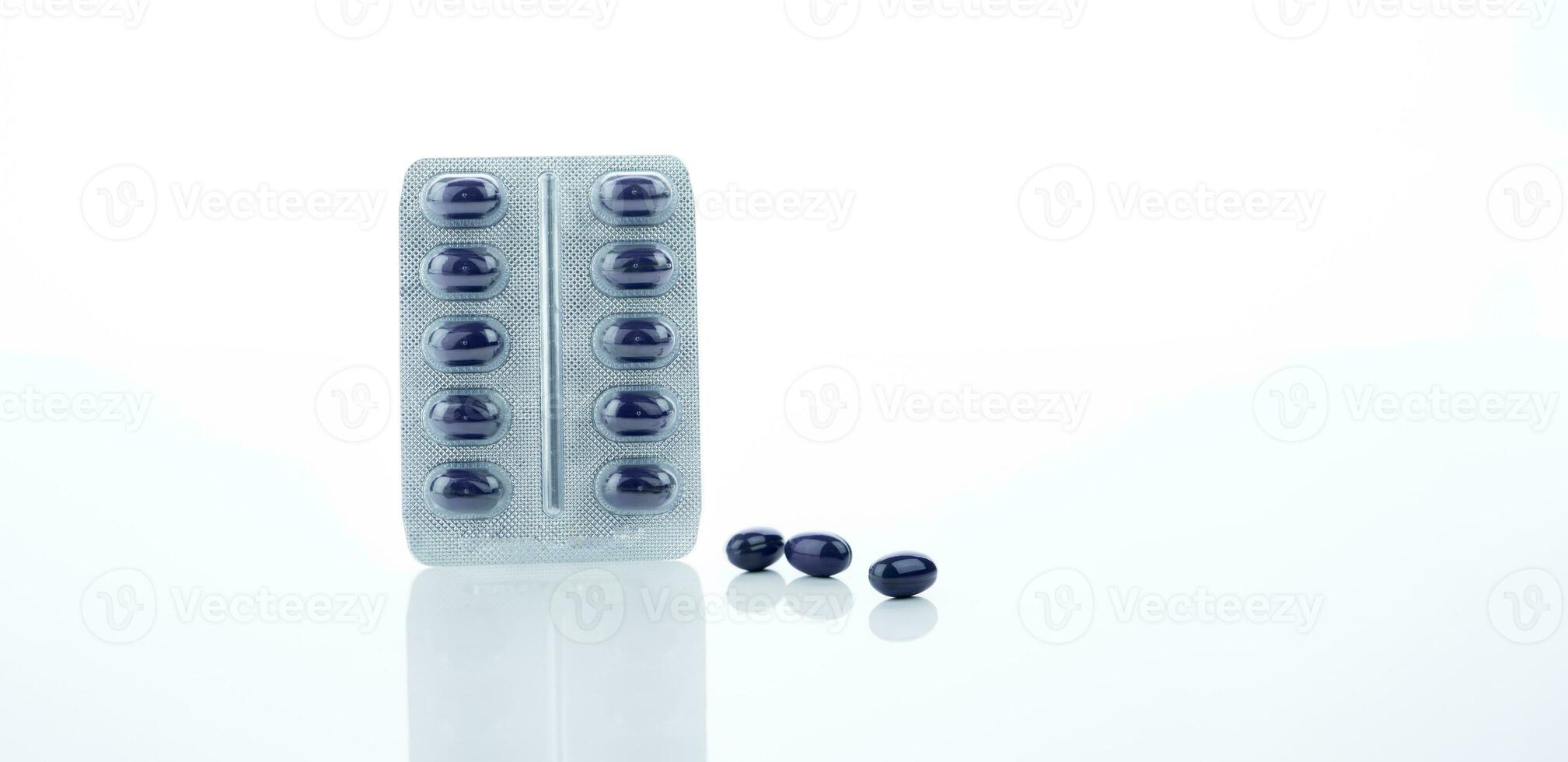 Dark blue capsule pills with blister pack of Echinacea Purpurea extract for immune health isolated on white background. Herbal medicine for cold relief. Alternative medicine. Health care and medicine. photo