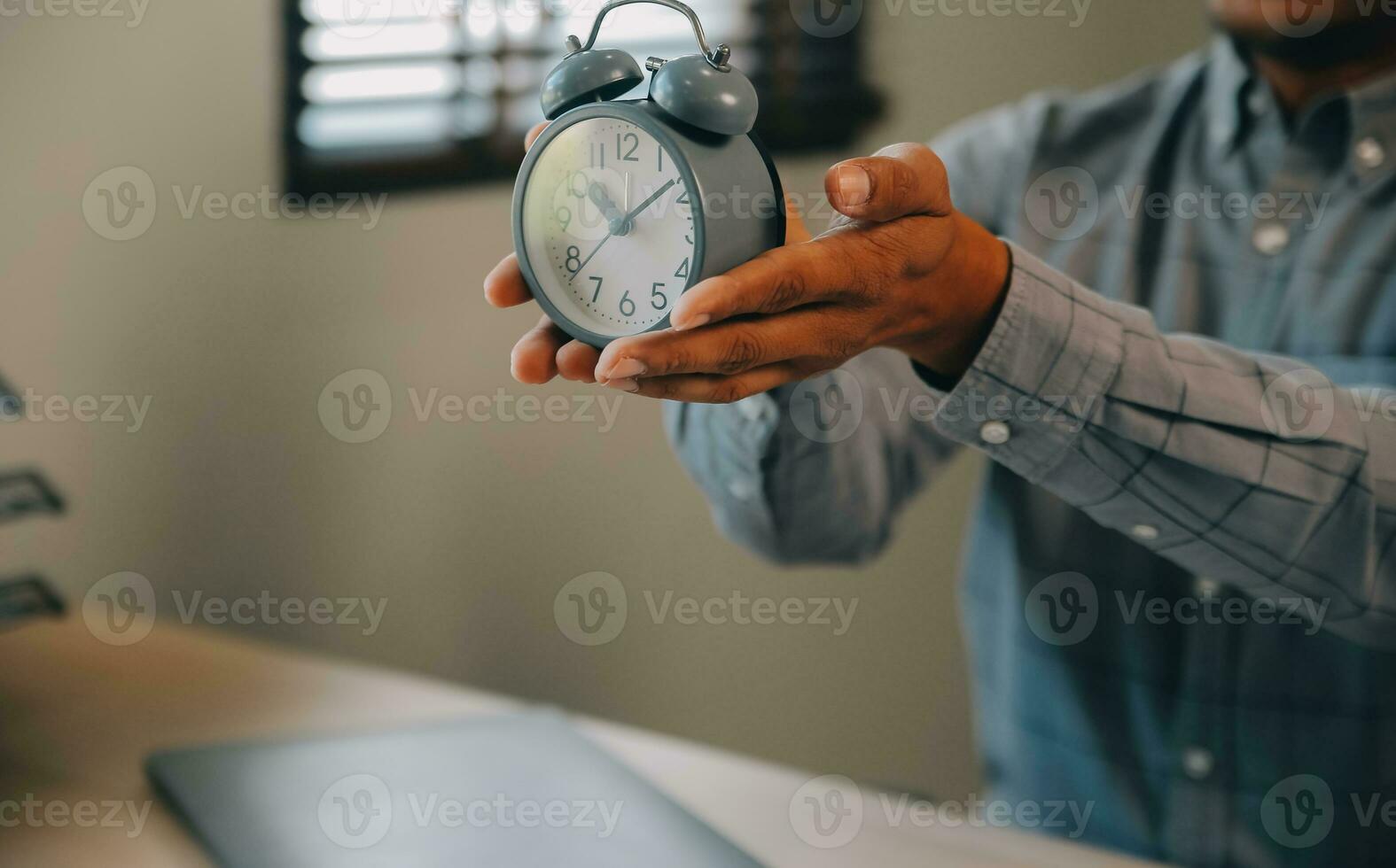 Business working times concept people work typing on laptop computer overlay with in time clock to lunch break photo