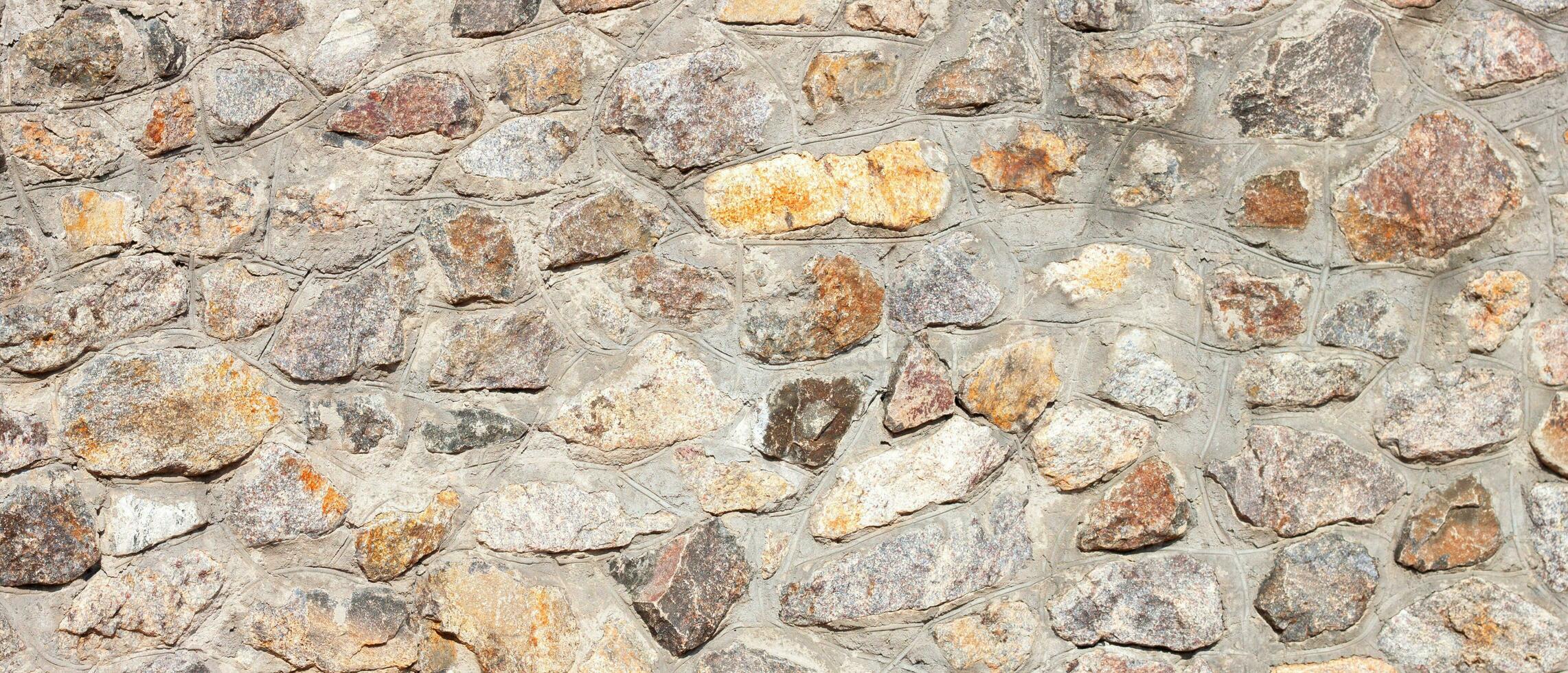 Background professional masonry with wild stone, architectural protective structure. AI generated. photo