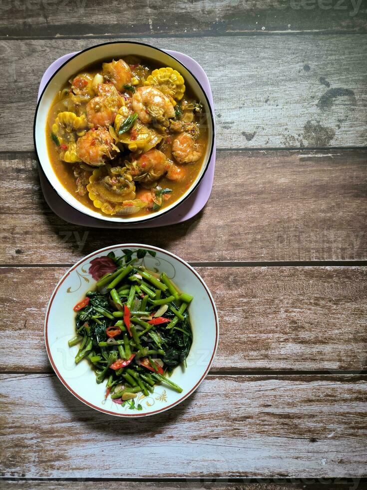 Stir fry spinach and spicy corn soup with extra shrimp photo