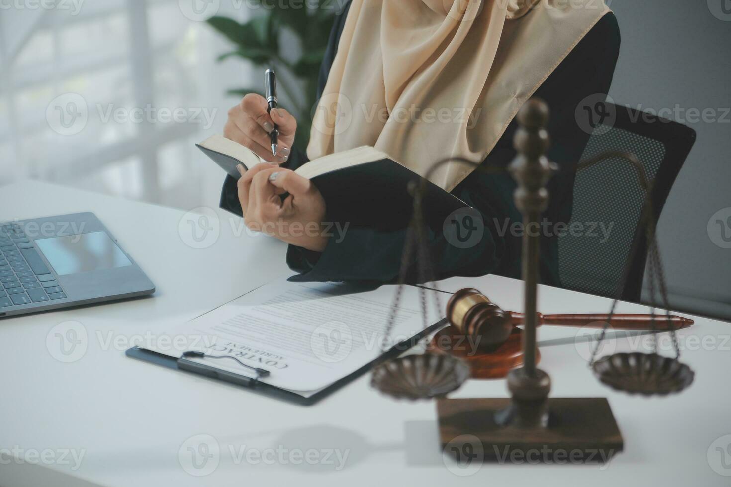 Business and lawyers discussing contract papers with brass scale on desk in office. Law, legal services, advice, justice and law concept picture with film grain effect photo