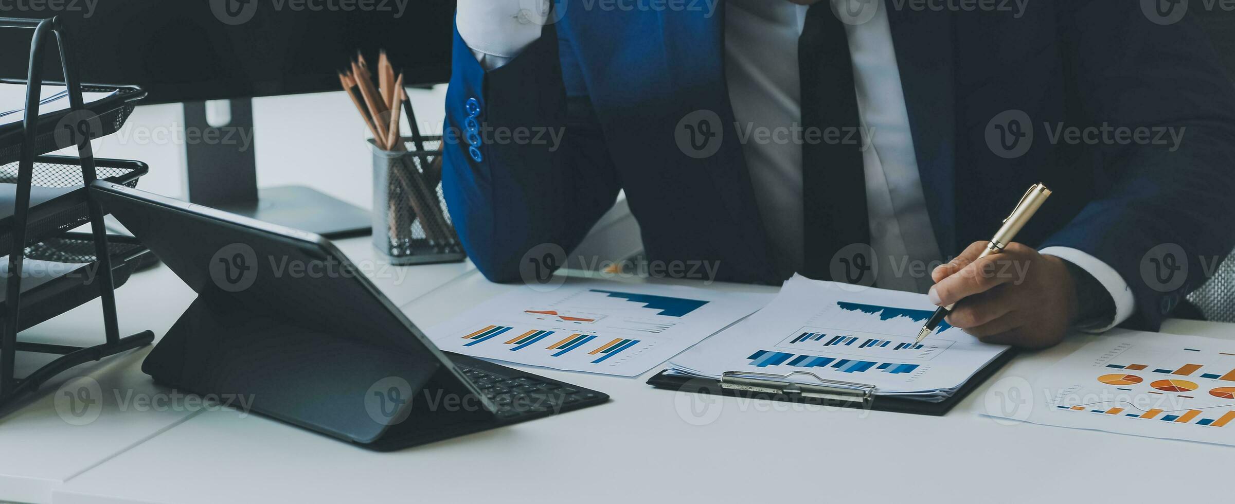 Team of business people working together in the meeting room office, teamwork background charts and graphs banner, double exposure successful teamwork,business planning concept. photo