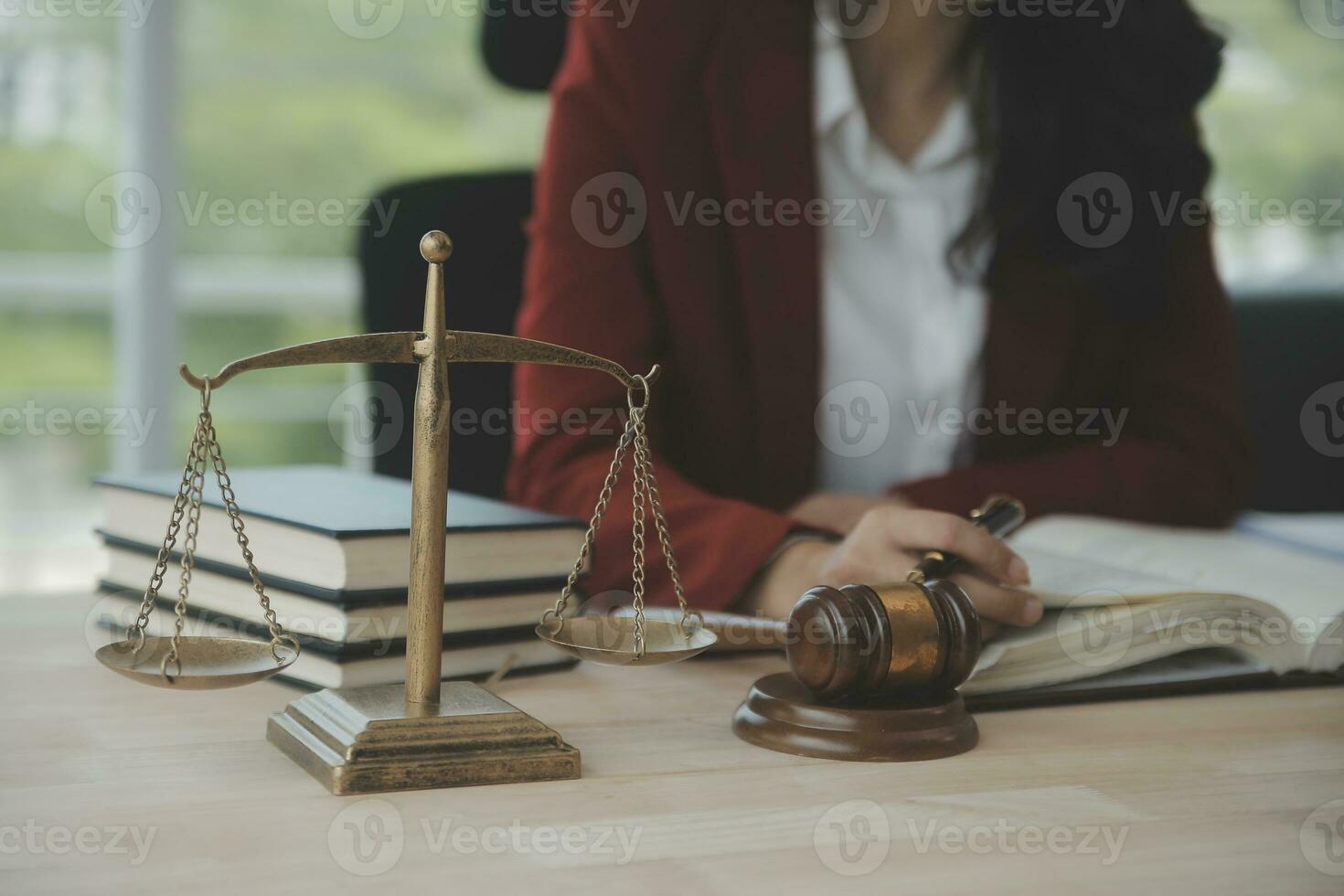 Business and lawyers discussing contract papers with brass scale on desk in office. Law, legal services, advice, justice and law concept picture with film grain effect photo