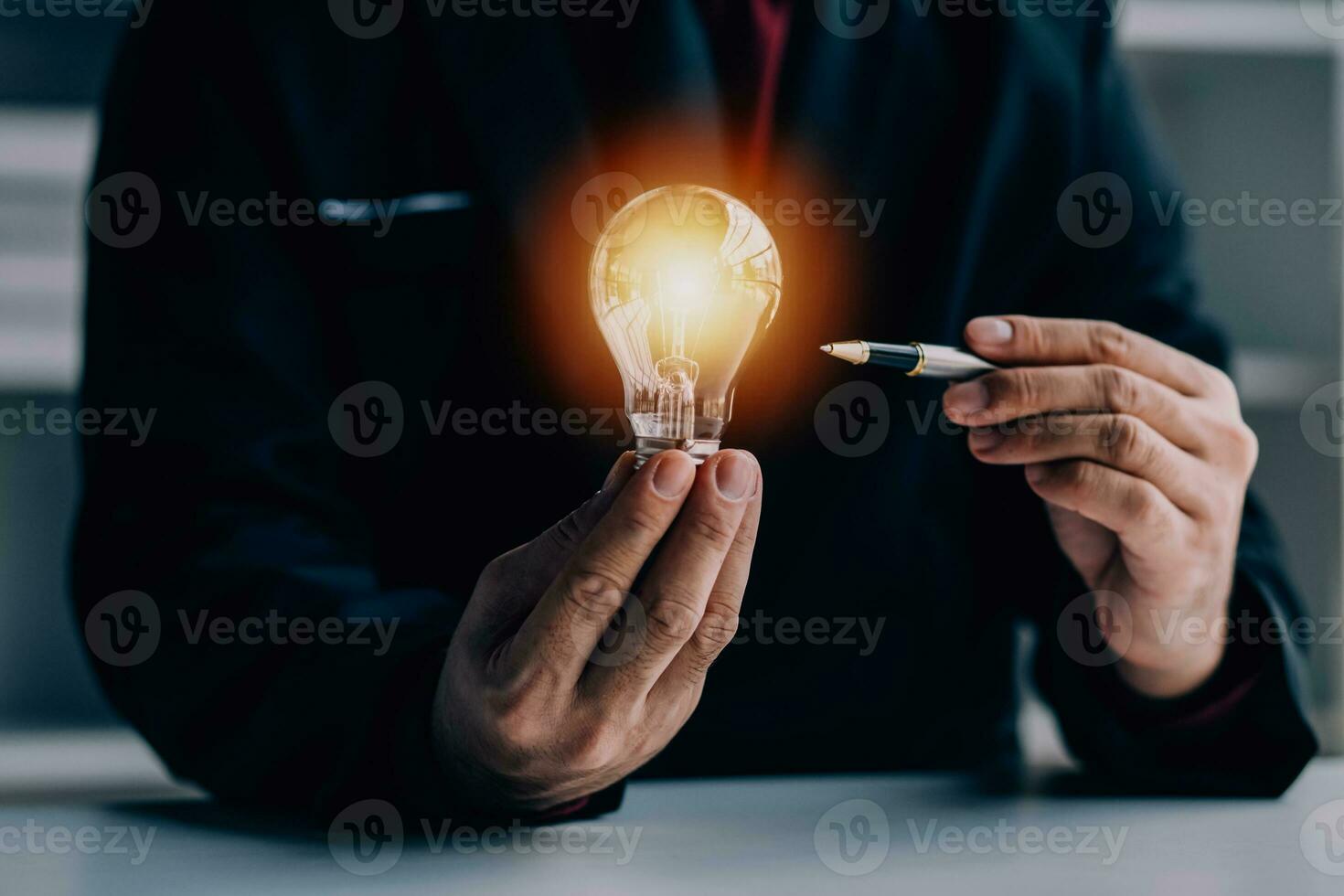 Business People touch Light bulb.Concept of Ideas for Success. Concept with Innovation Invention. Success Starting from a new idea to innovative technology based on data from the Internet, big data. photo