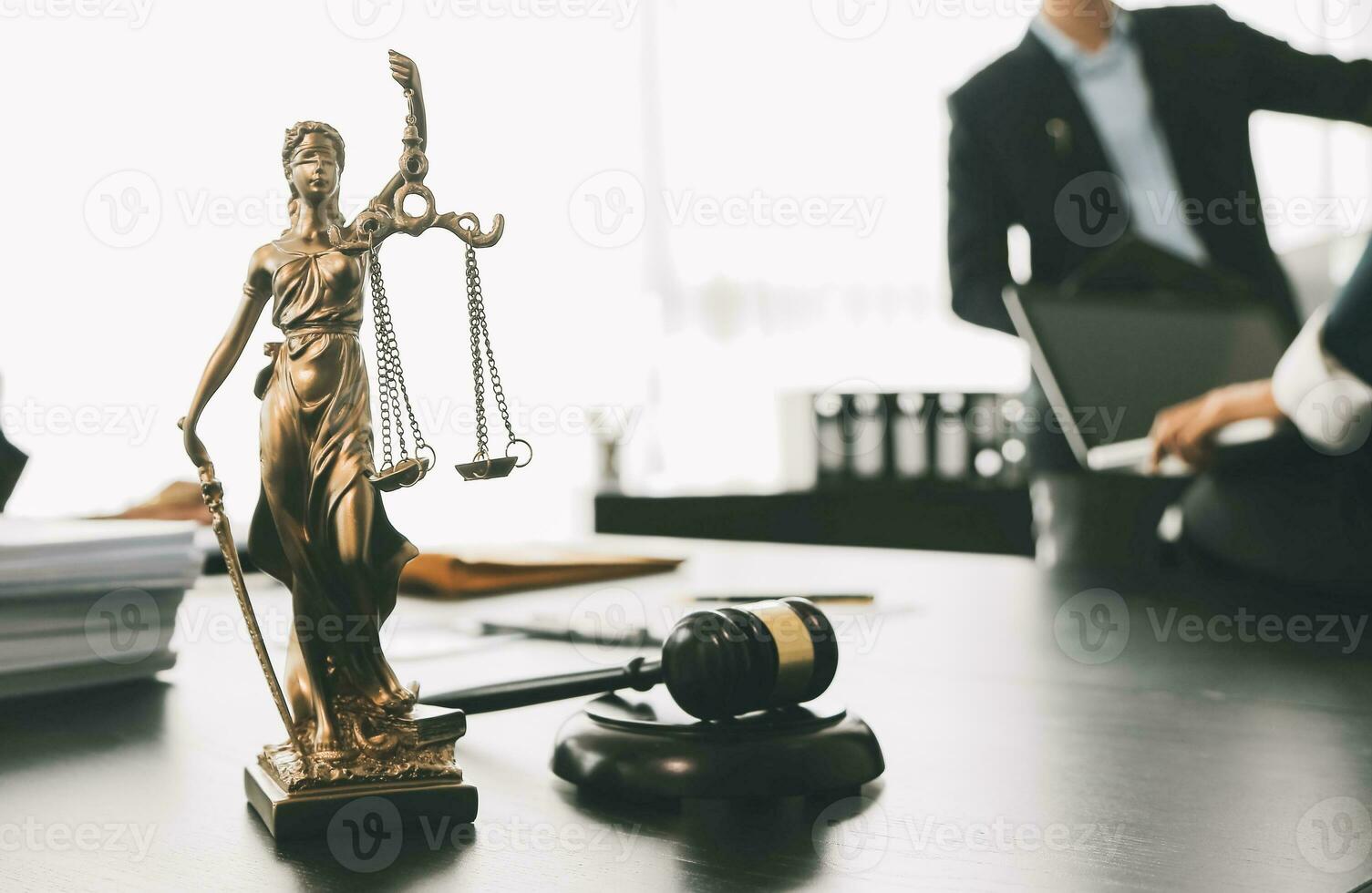 Consultation and conference of Male lawyers and professional businesswoman working and discussion having at law firm in office. Concepts of law, Judge gavel with scales of justice. photo