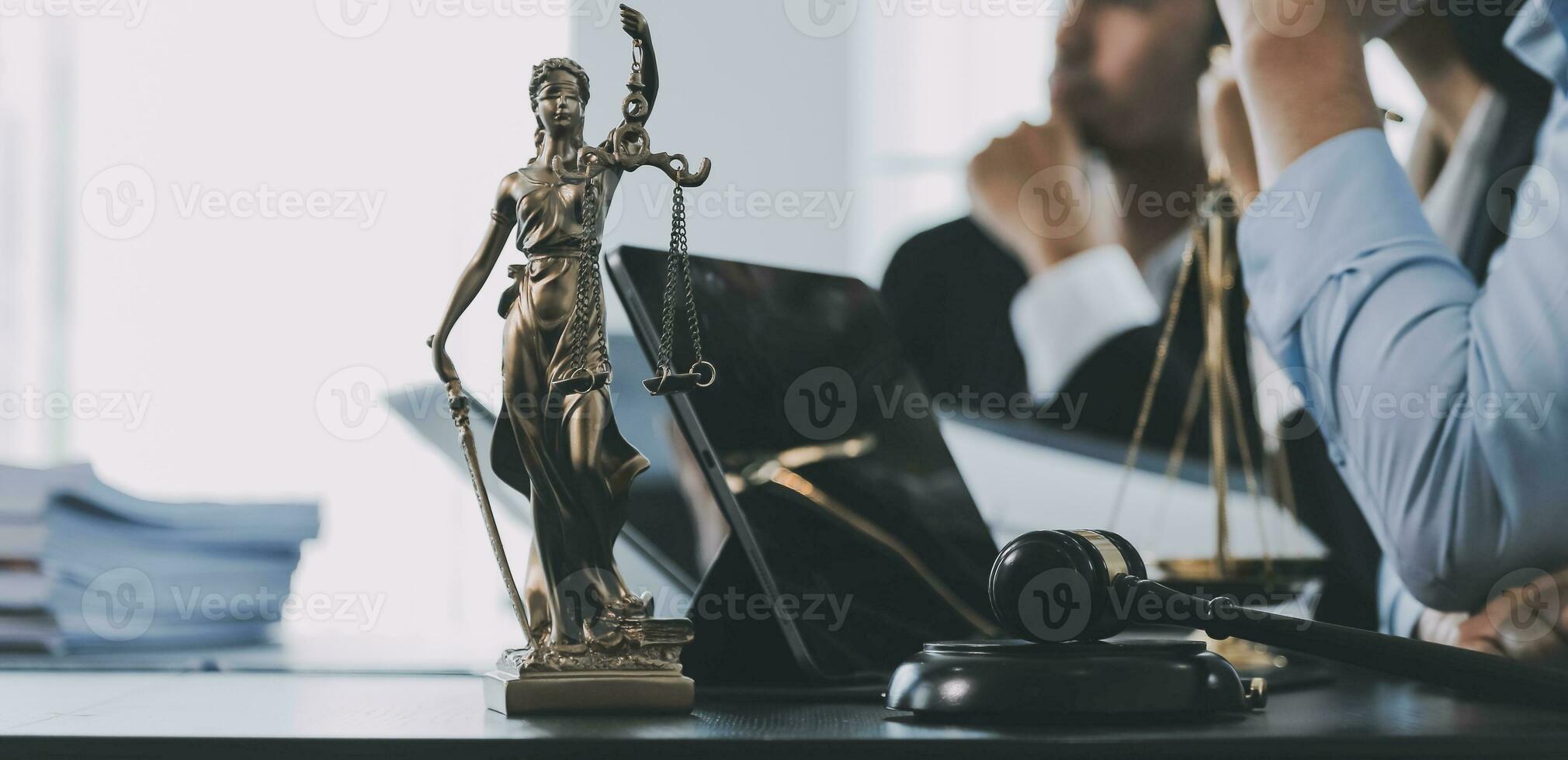 Business and lawyers discussing contract papers with brass scale on desk in office. Law, legal services, advice, justice and law concept picture with film grain effect photo