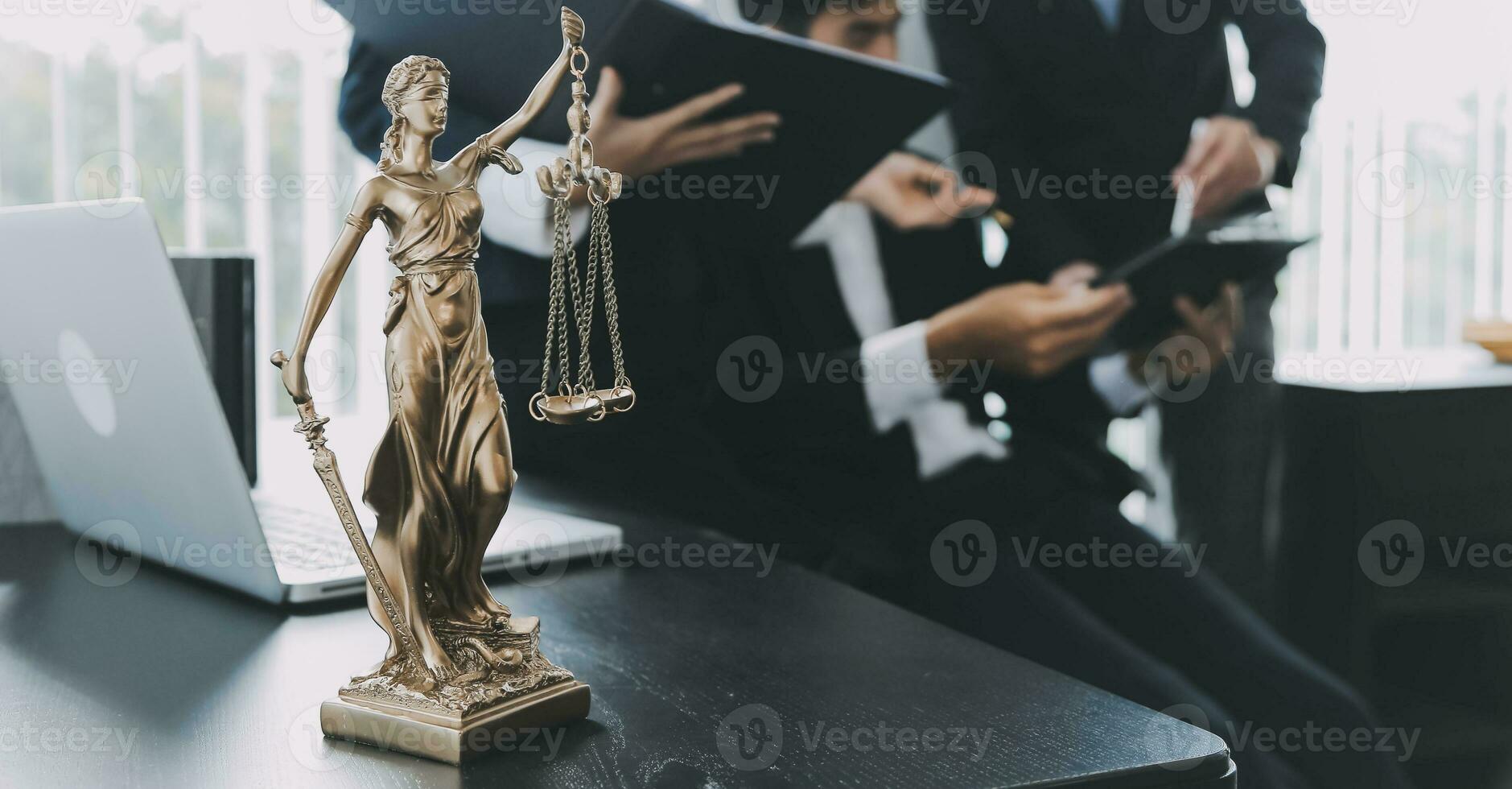 Consultation and conference of Male lawyers and professional businesswoman working and discussion having at law firm in office. Concepts of law, Judge gavel with scales of justice. photo