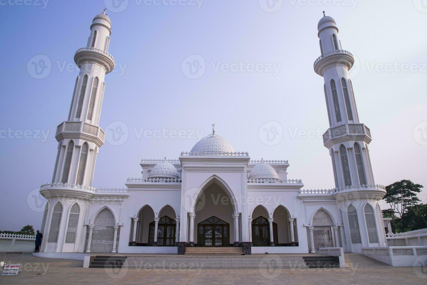 The most Beautiful architectural Elias Ahmed Chowdhury College Jame Masjid in Bangladesh under the Blue sky photo