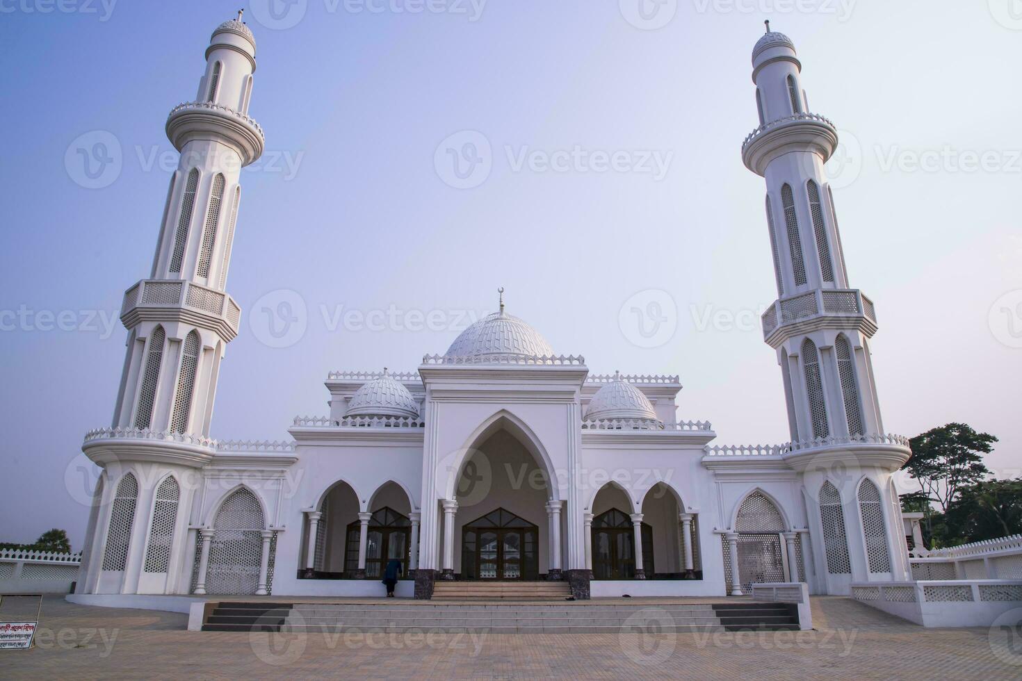 The most Beautiful architectural Elias Ahmed Chowdhury College Jame Masjid in Bangladesh under the Blue sky photo