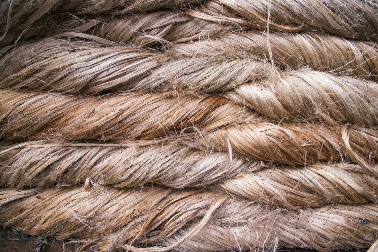 Folded Stacked Golden jute fiber abstract Pattern Texture  Can be used as a Background wallpaper photo