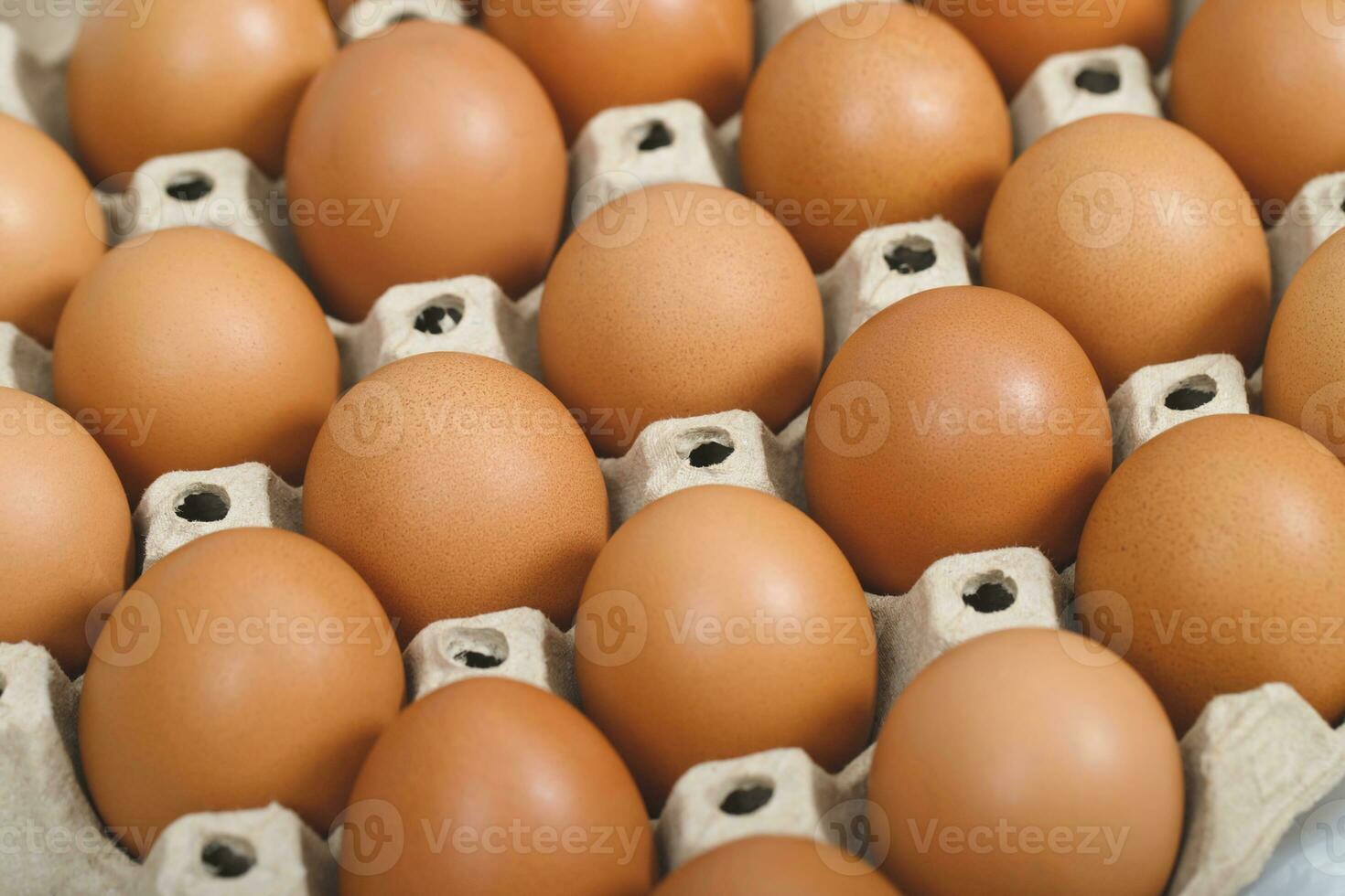 fresh chicken eggs for sale at a market. pattern background. photo