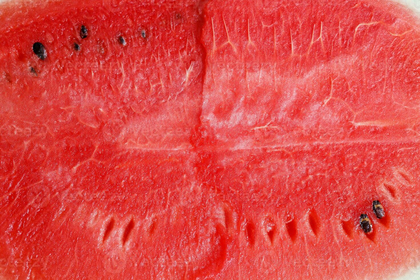 Red watermelon texture background image, rich in nutrients that are beneficial to health. photo