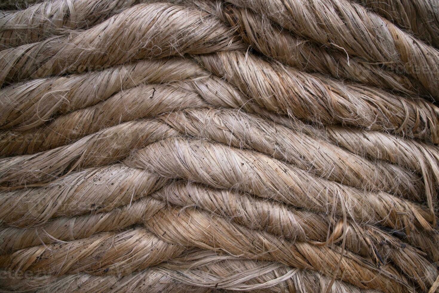 Folded Stacked Golden jute fiber abstract Pattern Texture  Can be used as a Background wallpaper photo