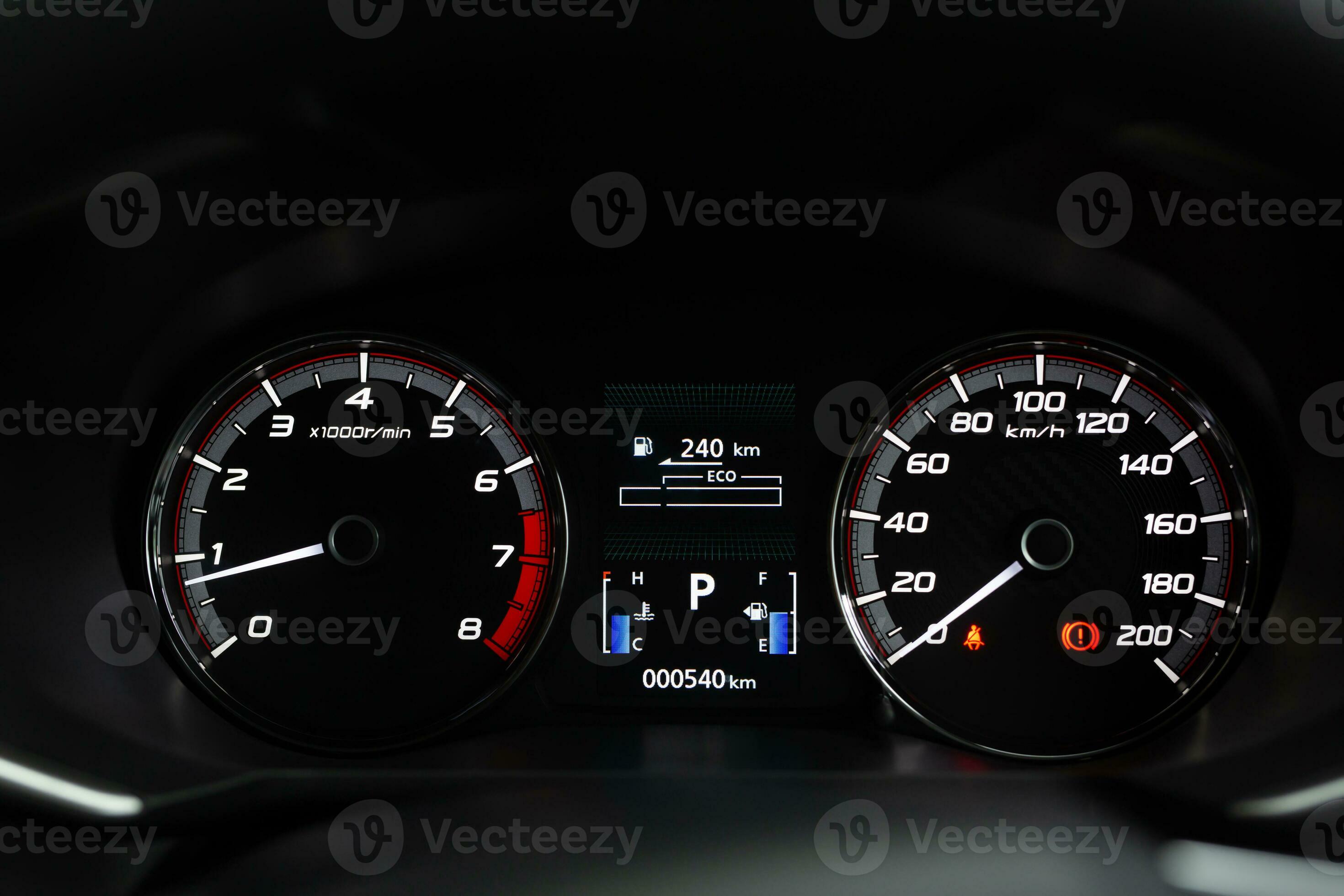 close up modern mileage car dashboard instrument panel interior with