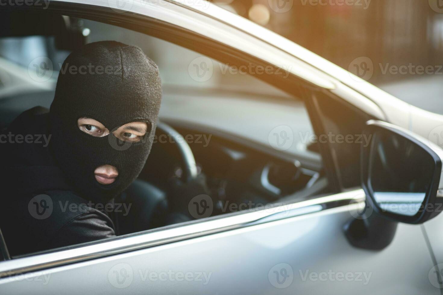 Car thief fleeing from police photo