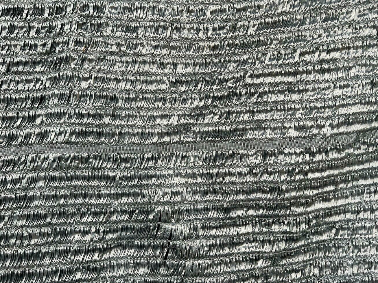 Sun Shade Net, Slan fabric used to filter the light for the plants pattern for background. photo