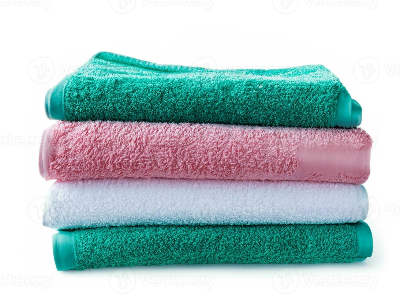 stack of colorful towels isolated on white background photo