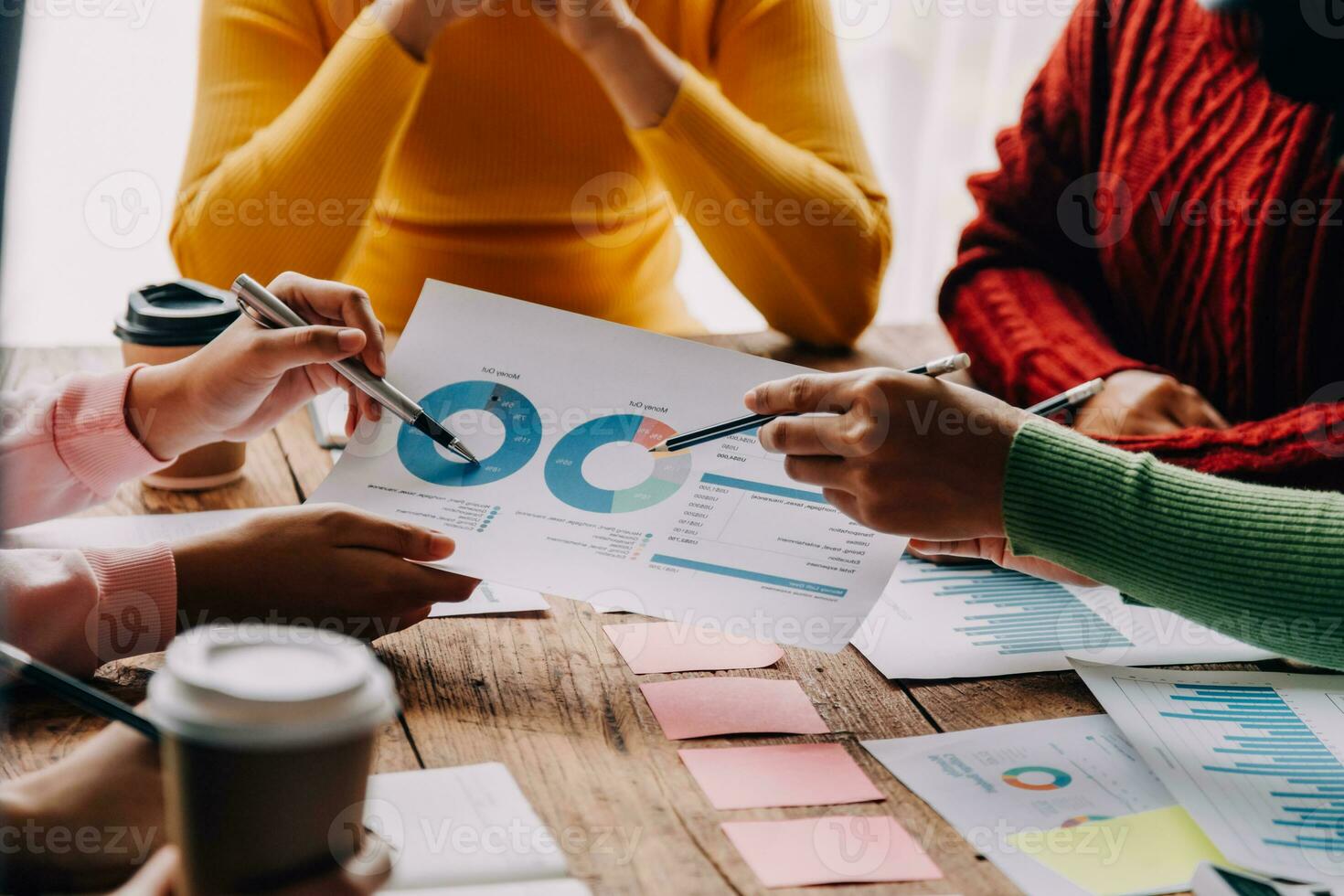 Brainstorming Collaboration and successful partnership analysis by Young business Asian people working in an office workspace photo