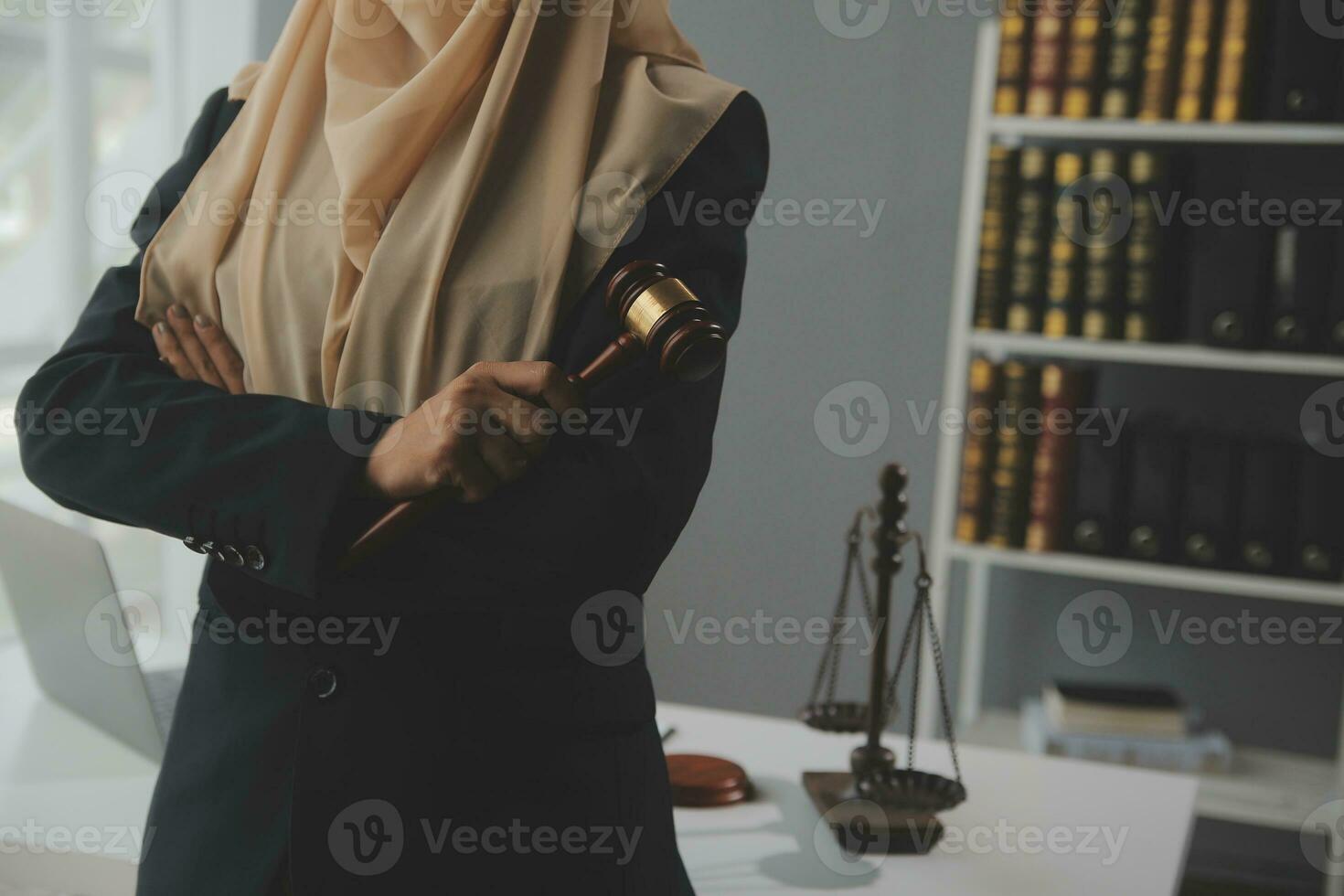 Business and lawyers discussing contract papers with brass scale on desk in office. Law, legal services, advice, justice and law concept picture with film grain effect photo