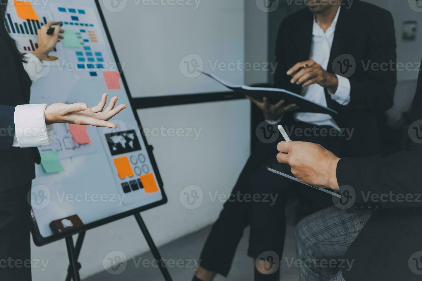 Business team working with new startup project plan and discussion information for financial strategy with laptop and digital tablet in a modern business lounge. photo