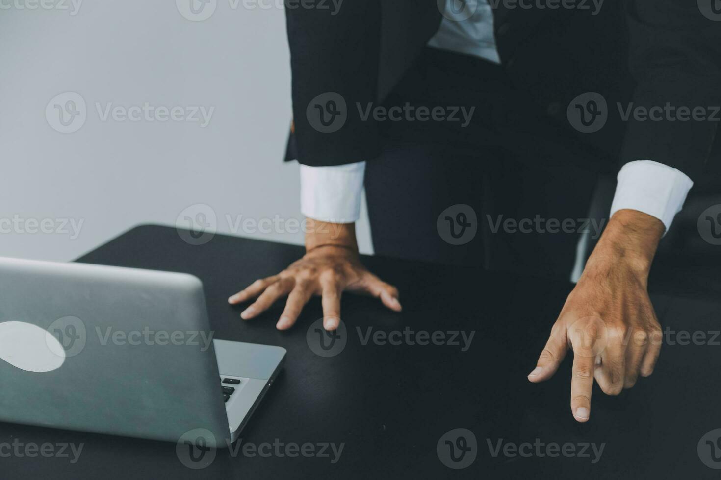 Entrepreneur Asian businessman and businesswoman discussing new business project in tablet in modern Meeting In Modern Office, Asian business casual concept. photo