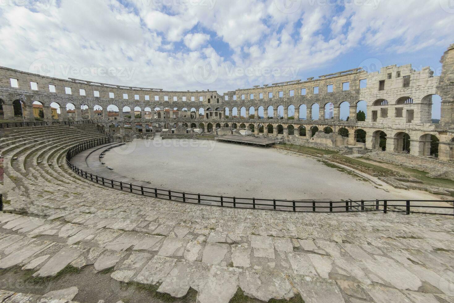 View inside the Roman amphitheater in the Croatian city of Pula without people photo