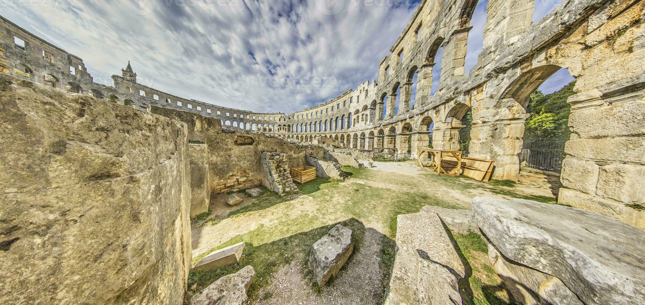 View inside the Roman amphitheater in the Croatian city of Pula without people photo