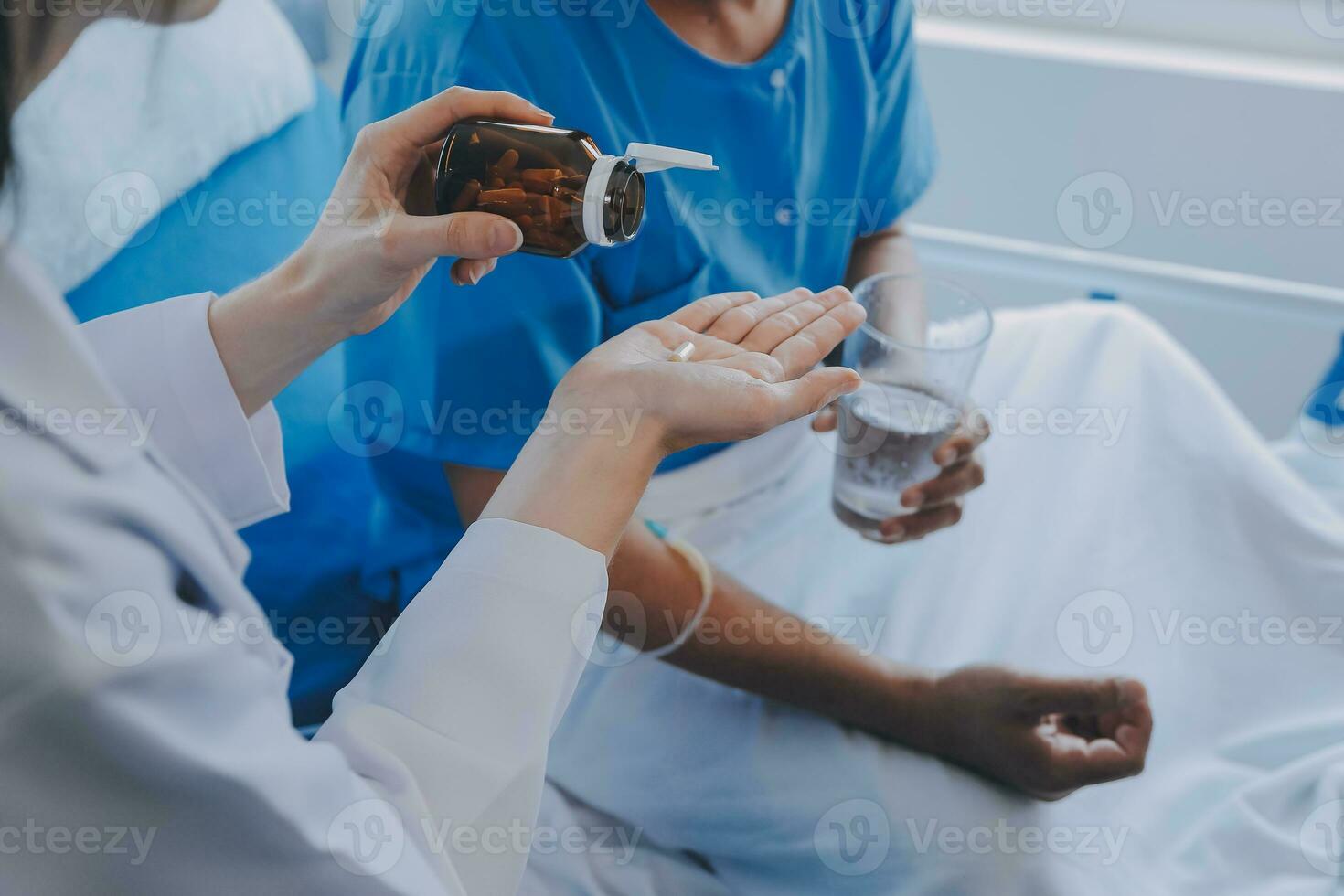 Injured patient showing doctor broken wrist and arm with bandage in hospital office or emergency room. Sprain, stress fracture or repetitive strain injury in hand. Nurse helping customer. First aid. photo