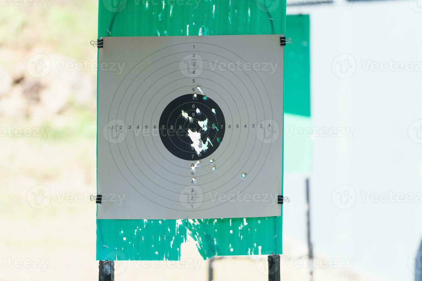 A shooting target that has been shot by a shooter in a shooting range. photo