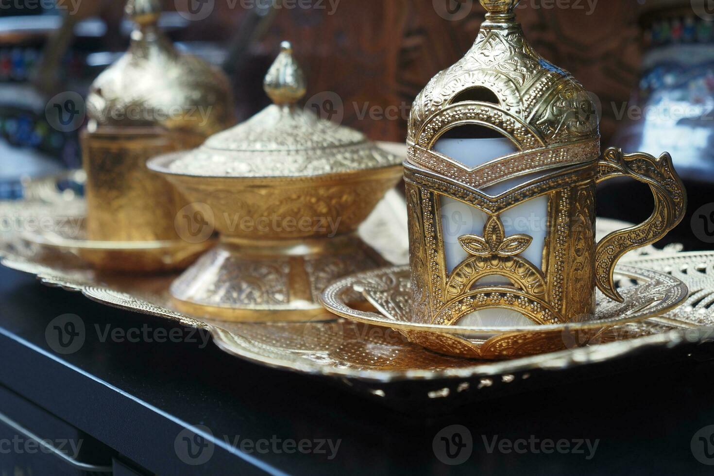 a cup of turkish coffee on table photo