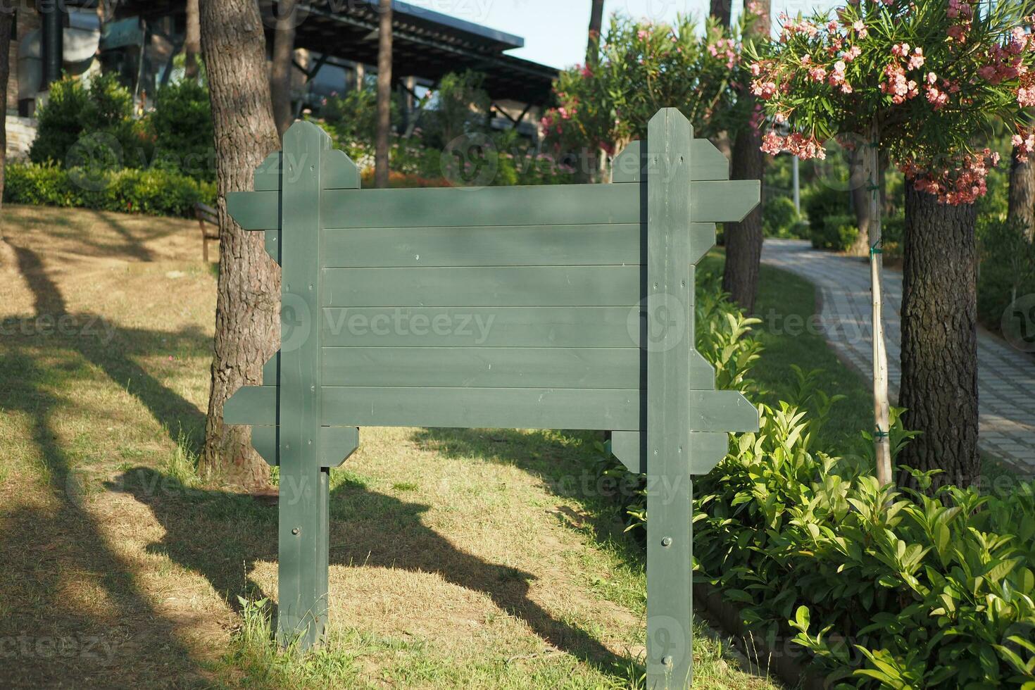 wooden sign in the a park with copy space concept. photo