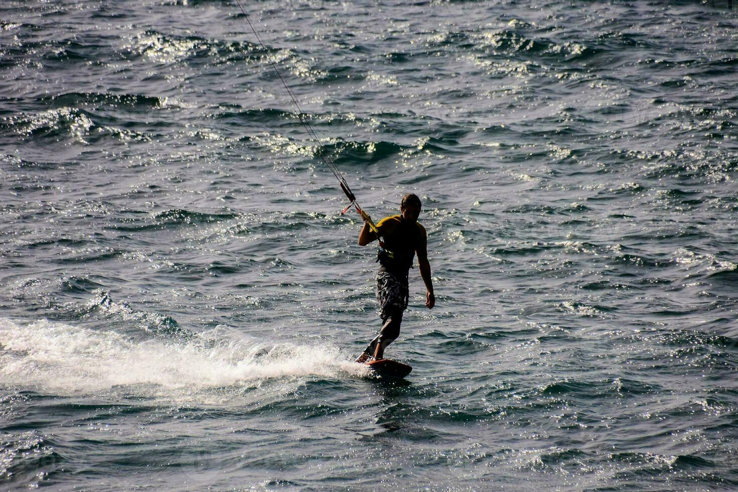 Surfing in the ocean photo