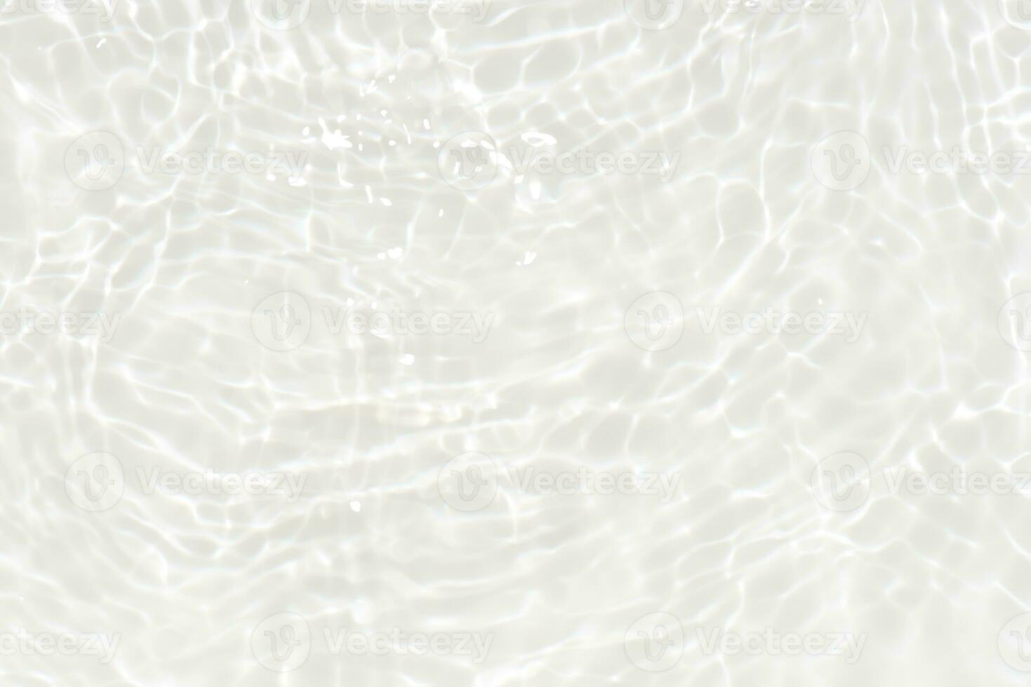 Defocus blurred transparent blue colored clear calm water surface texture with splashes reflection. Trendy abstract nature background. Water waves in sunlight with copy space. Blue watercolor shine. photo