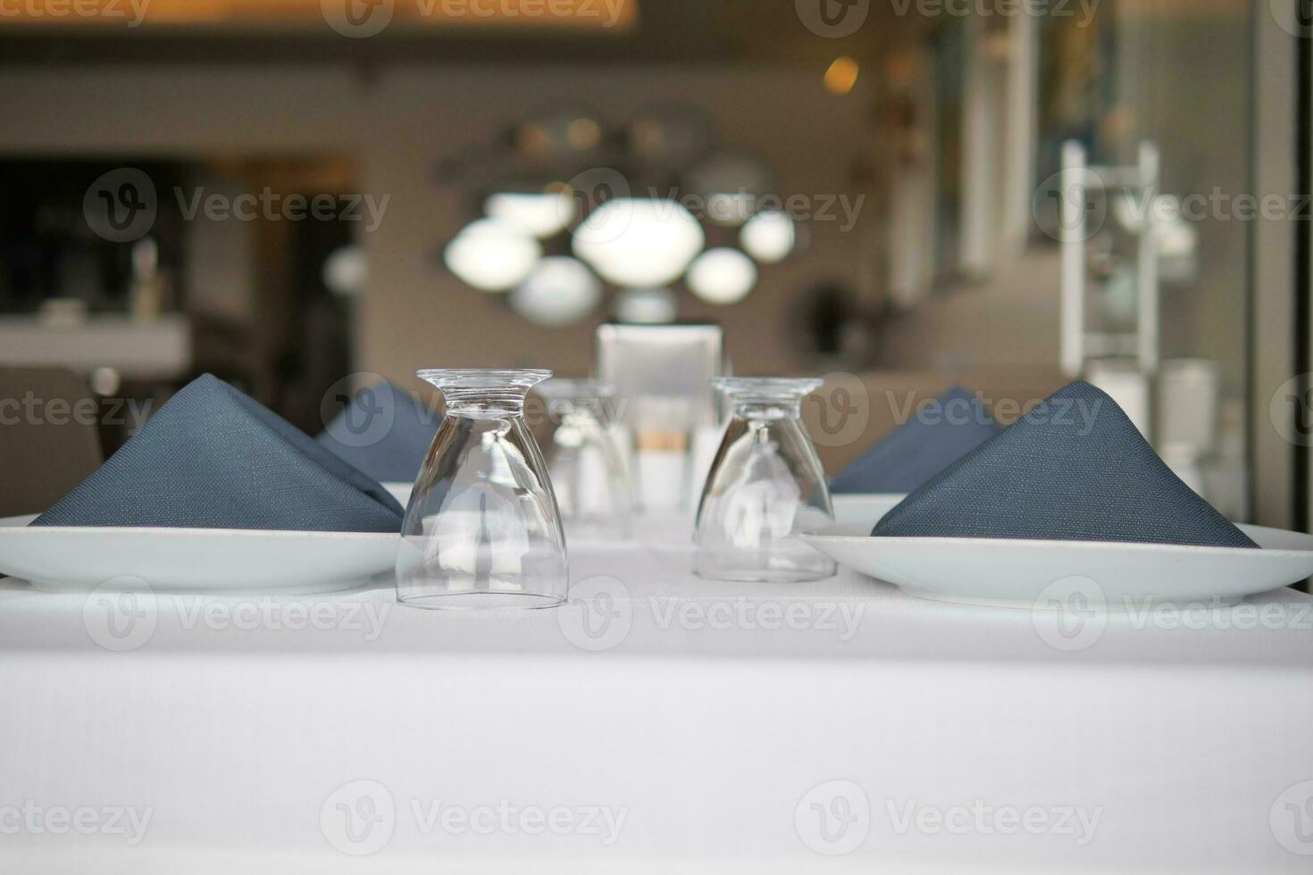 served and decorated round festive table in a restaurant photo