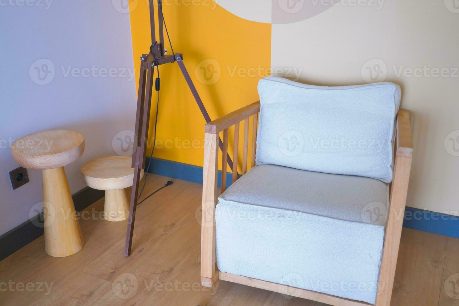 retro vantage armchairs with a lamp at home . photo