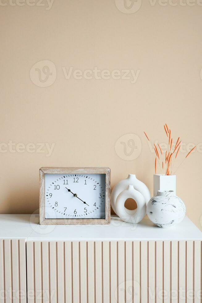 simple modern clock on table photo
