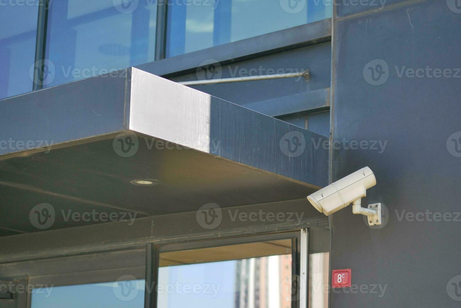 CCTV security camera operating outdoor photo