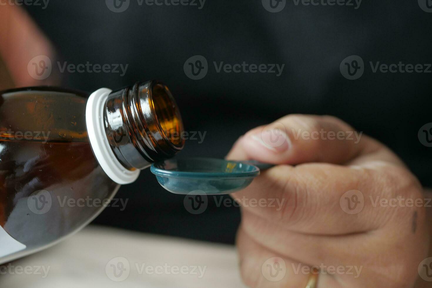 A dose of cough syrup. photo