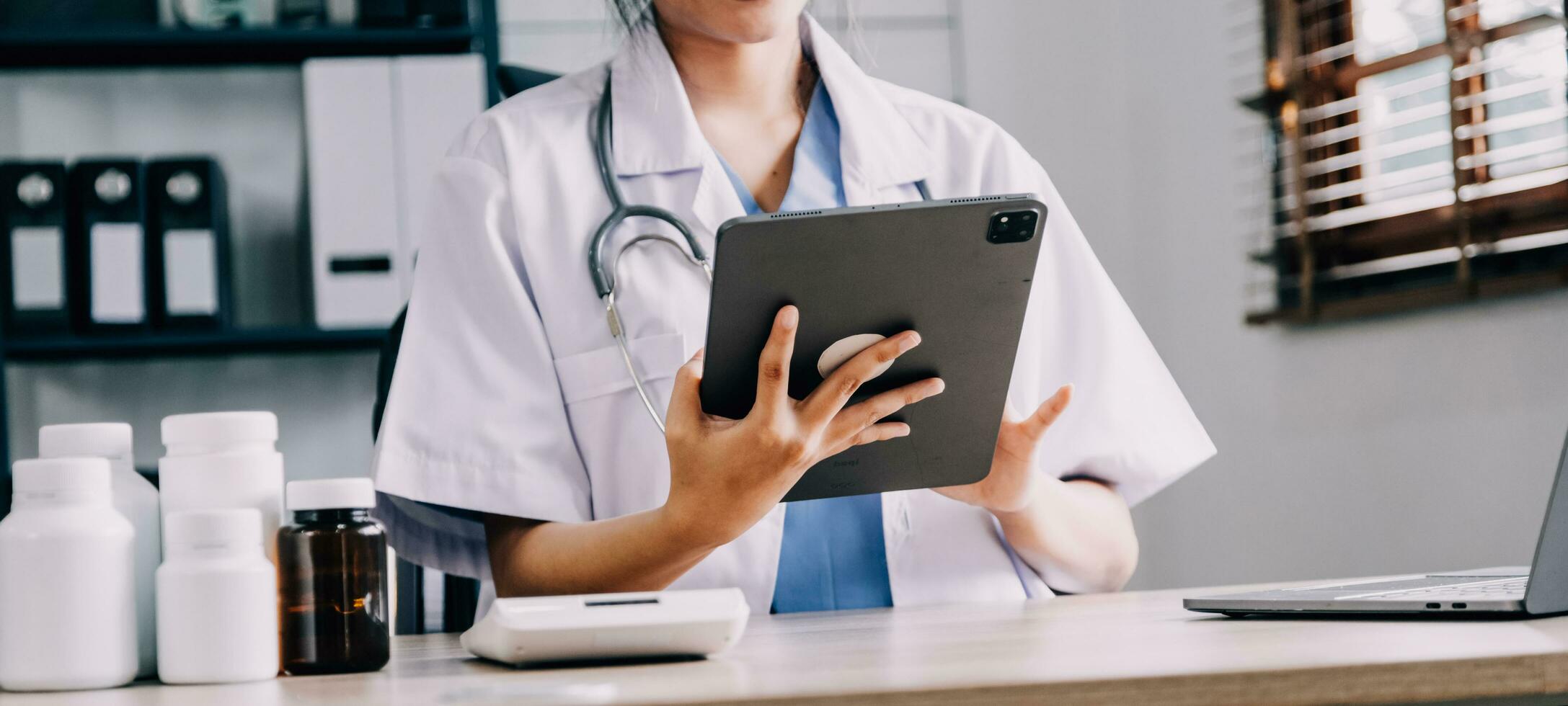 Medical doctor or physician consulting patient's health online using
