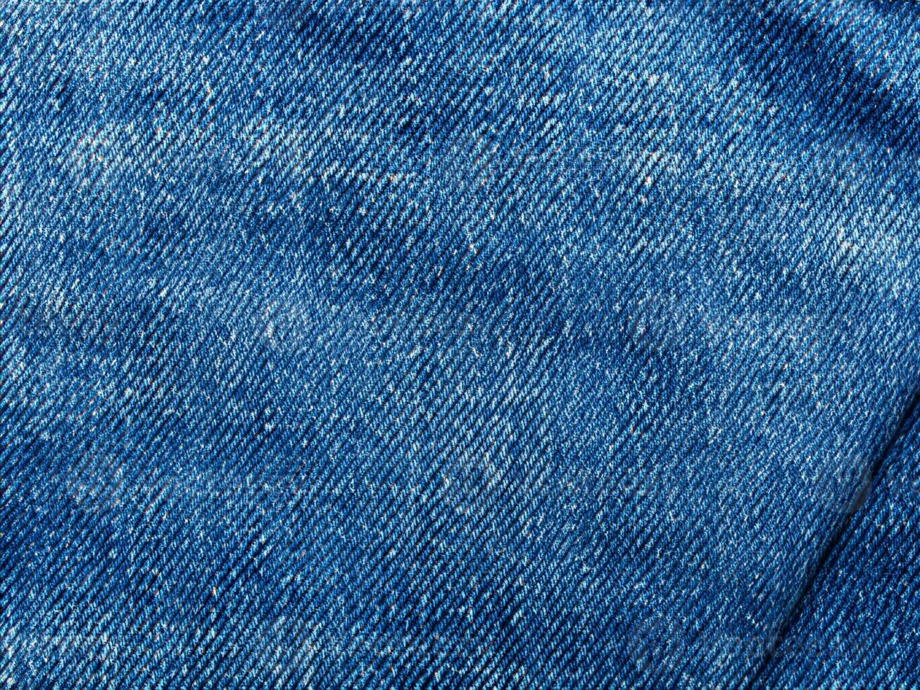 close up blue jeans background texture photo