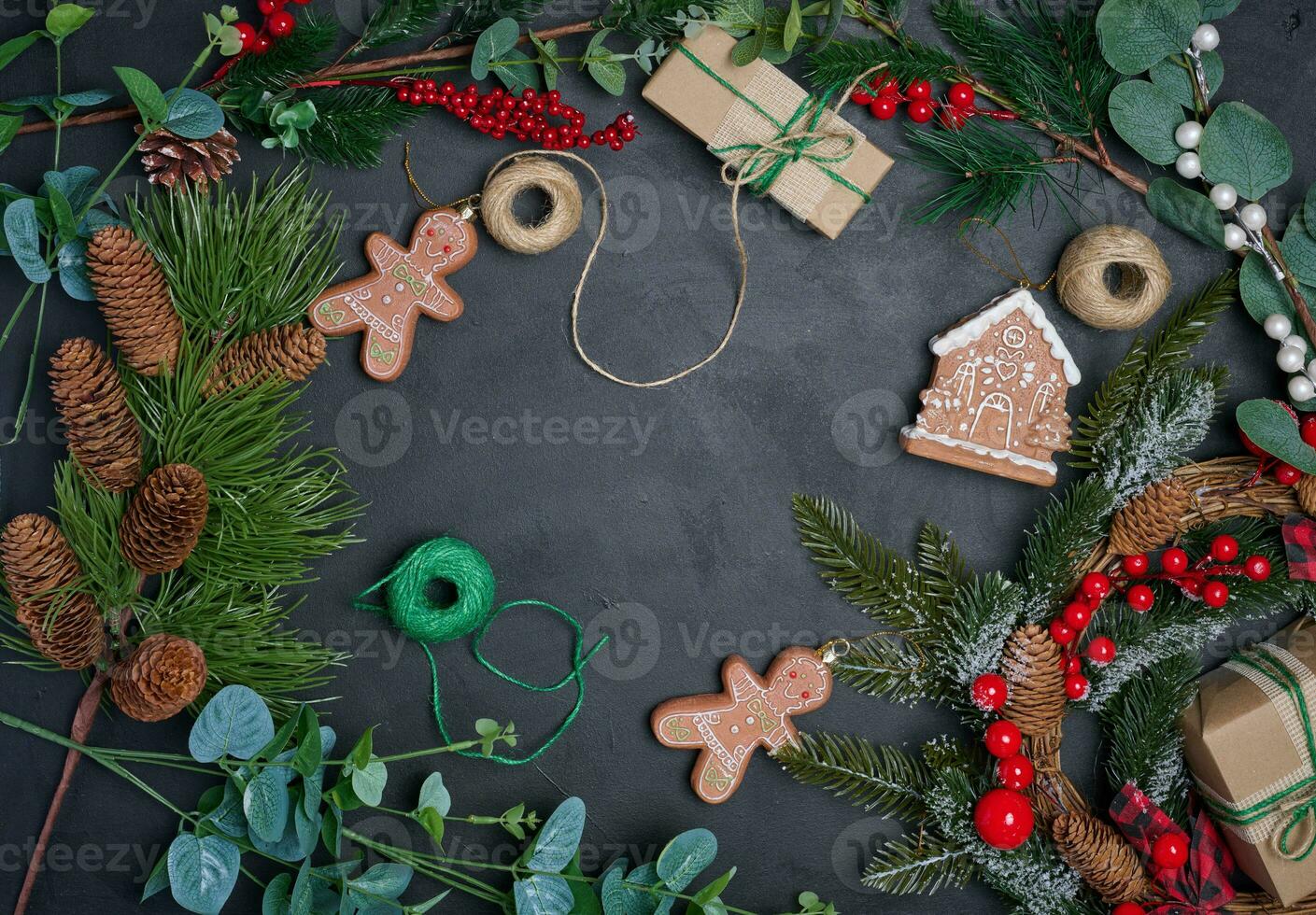 Christmas decor, gift red boxes on a black background, top view. Place for inscription photo