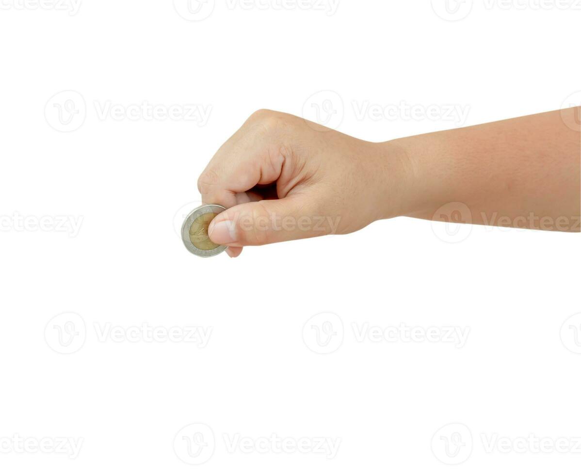 Child or kid hand holding coin isolated on white back ground with clipping path. Concept of saving money for the future or money growth photo