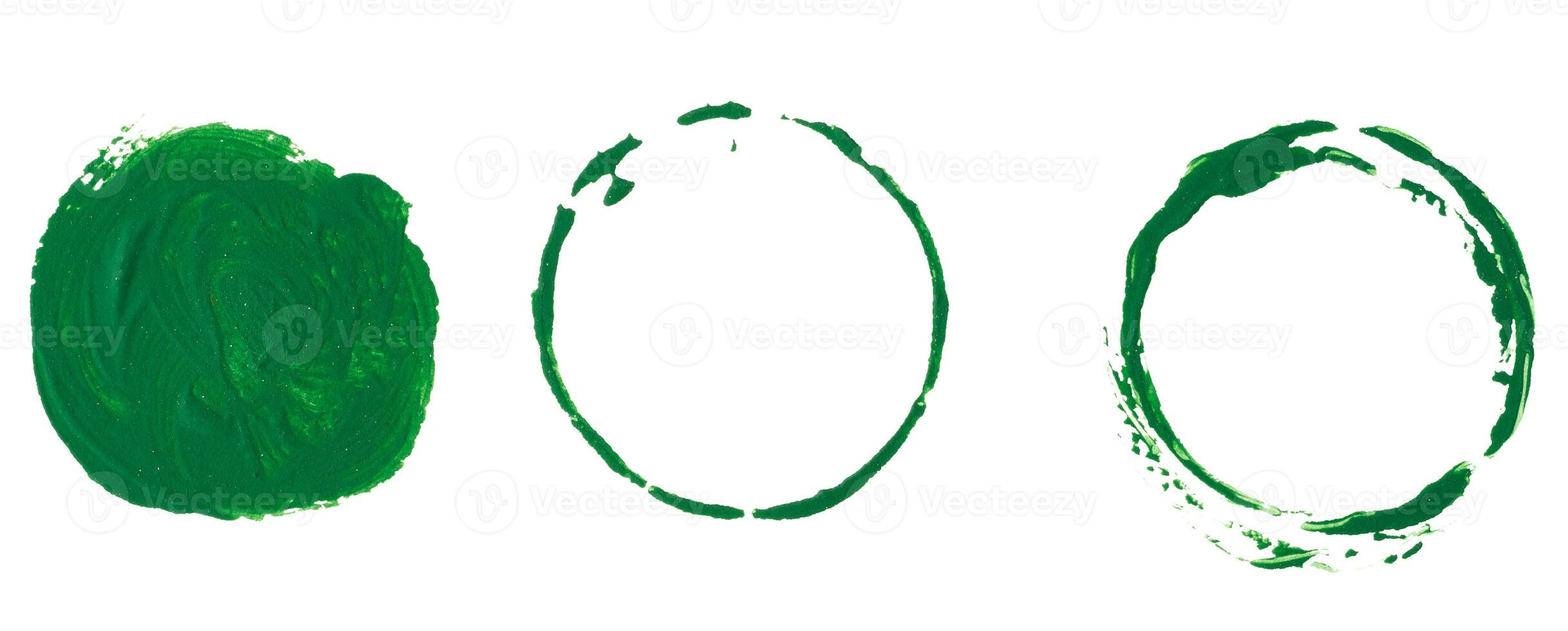 Round green paint imprint on white isolated background photo