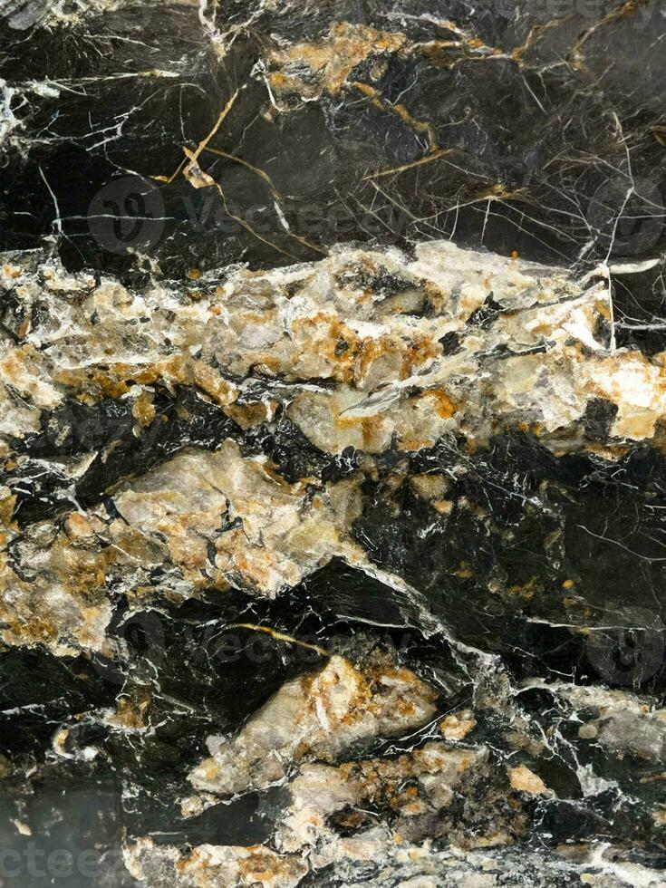 Close up of black marble textured background photo