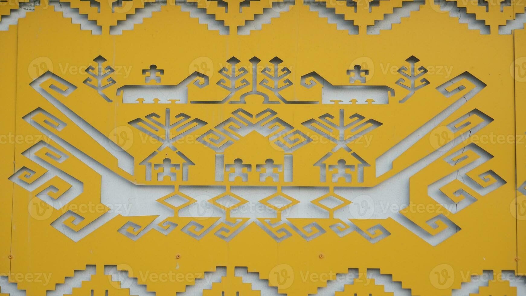 Siger or traditional crown Lampung yellow color pattern for abstract background. Ethnic Lampung Pattern. Yellow tapis pattern special Lampung. typical crown of Lampung pattern abstract photo