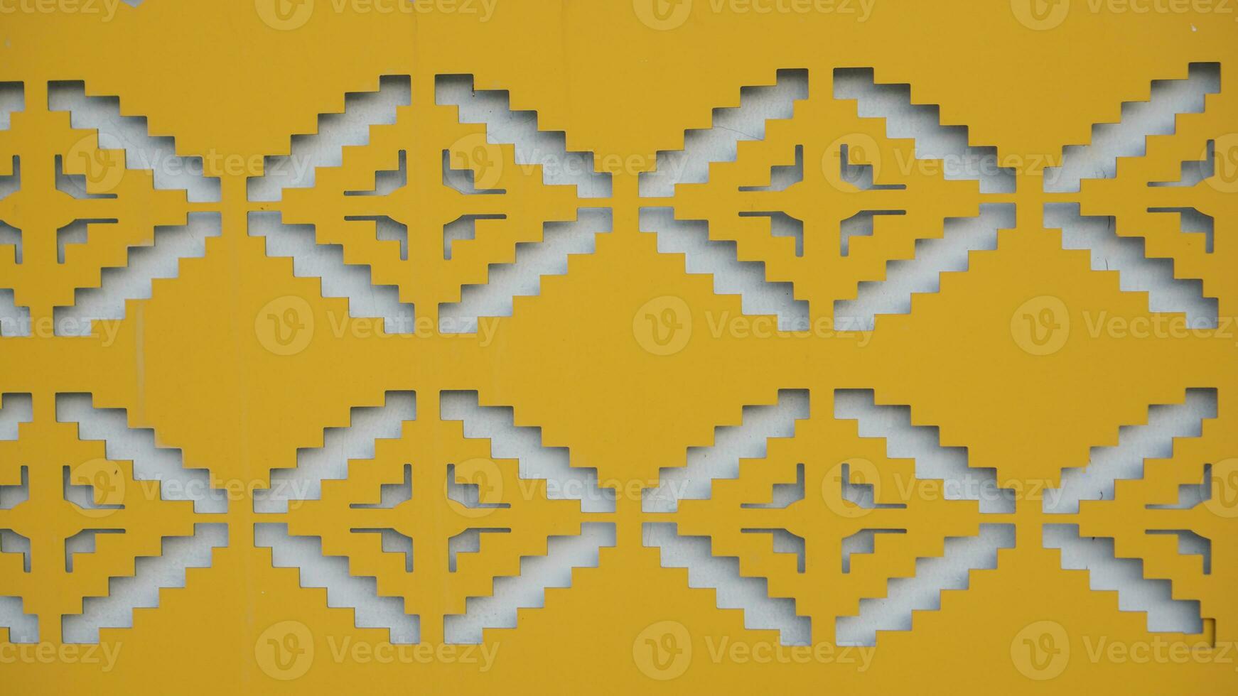 Siger or traditional crown Lampung yellow color pattern for abstract background. Ethnic Lampung Pattern. Yellow tapis pattern special Lampung. typical crown of Lampung pattern abstract photo