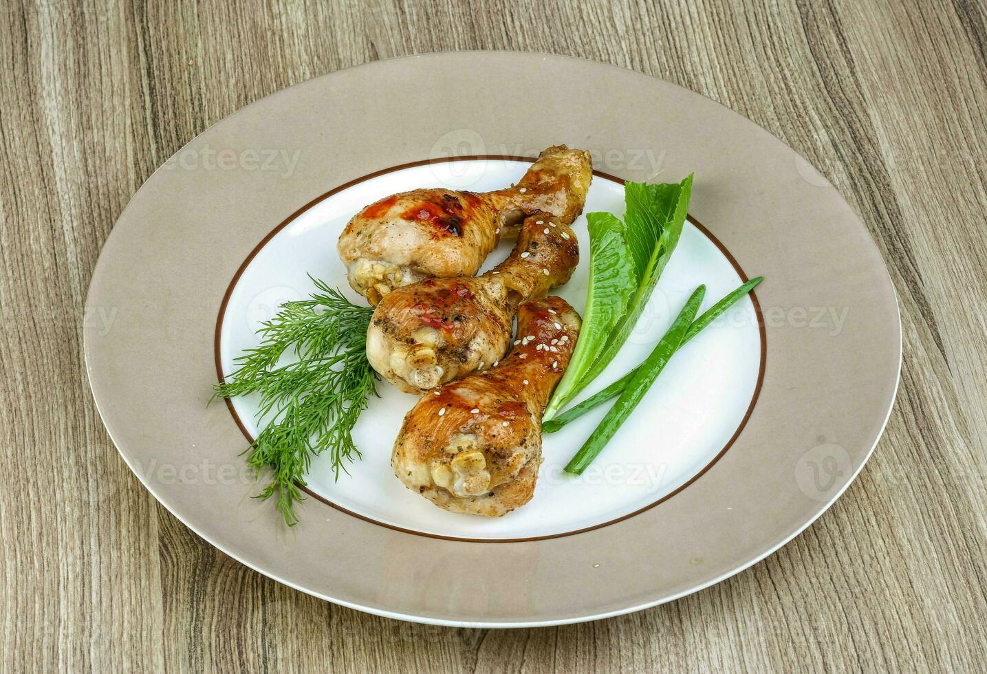 Grilled chicken legs photo