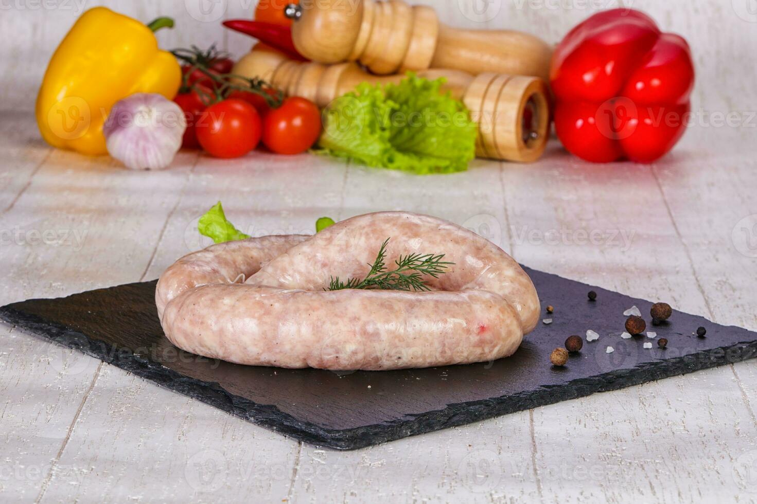 Raw pork sausages photo