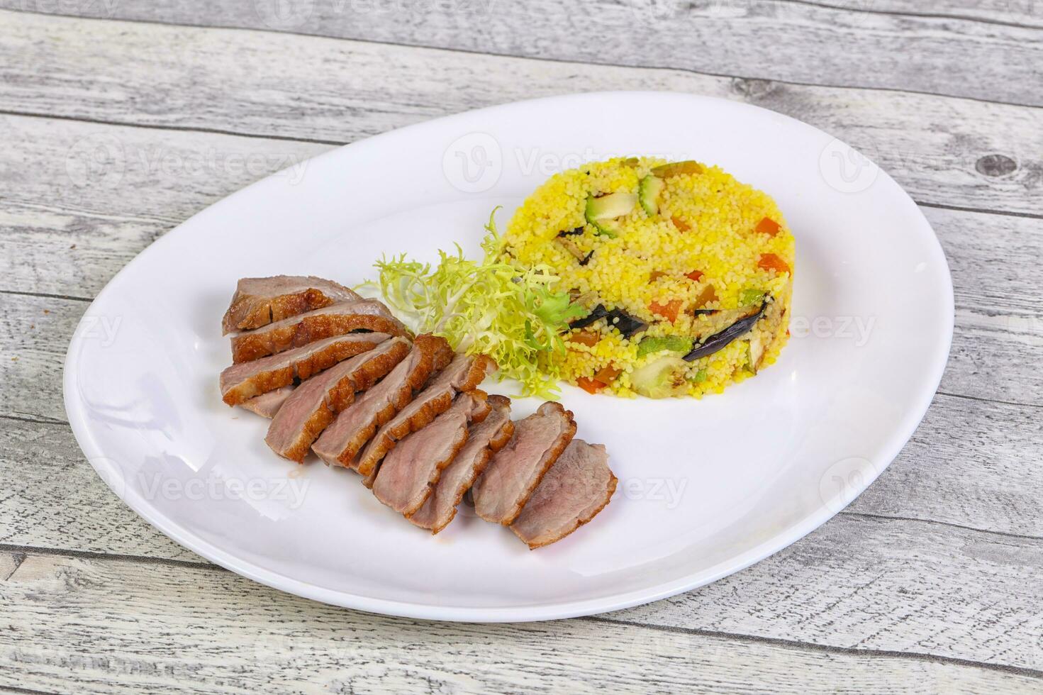 Roasted Duck breast with couscous photo